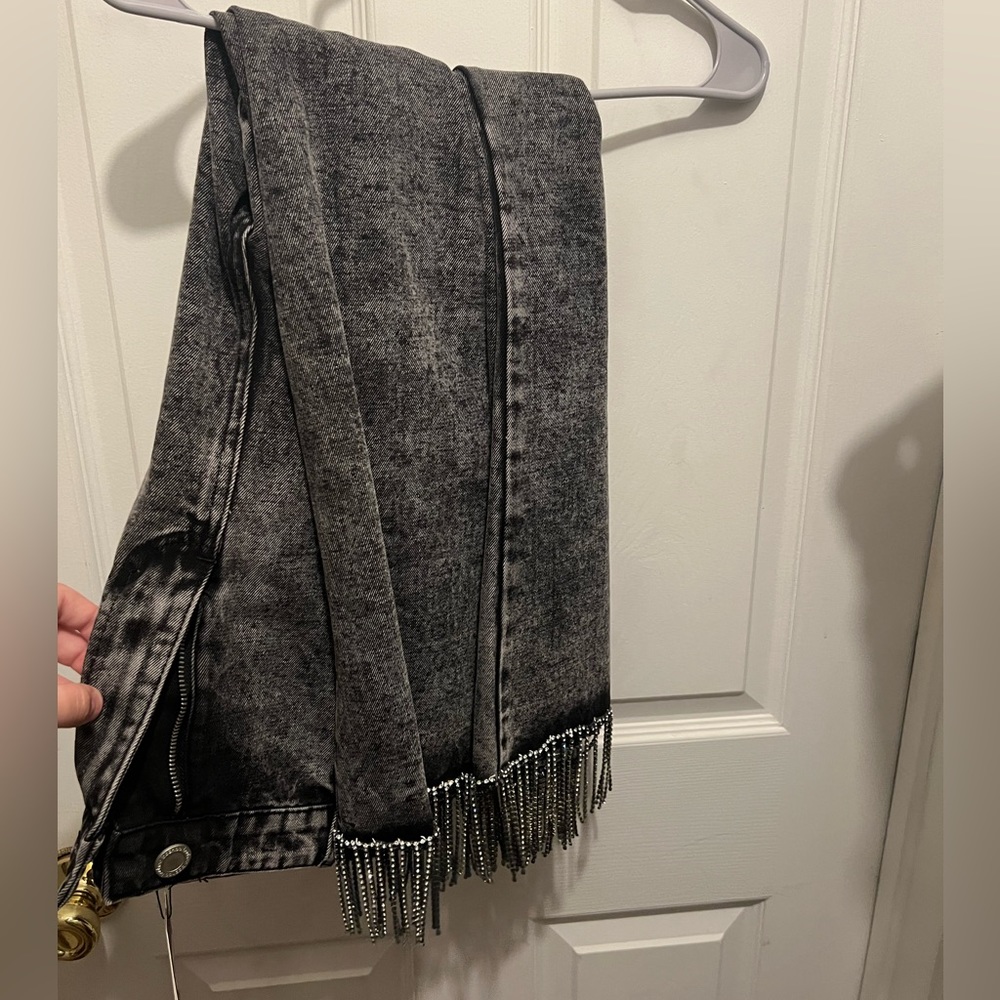 BooHoo brand crystal fringed cropped jeans.